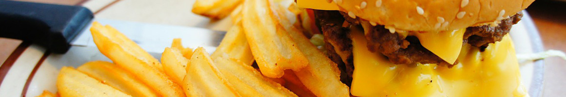 Eating Burger Hot Dog at Jack's Hamburgers restaurant in Dublin, GA.